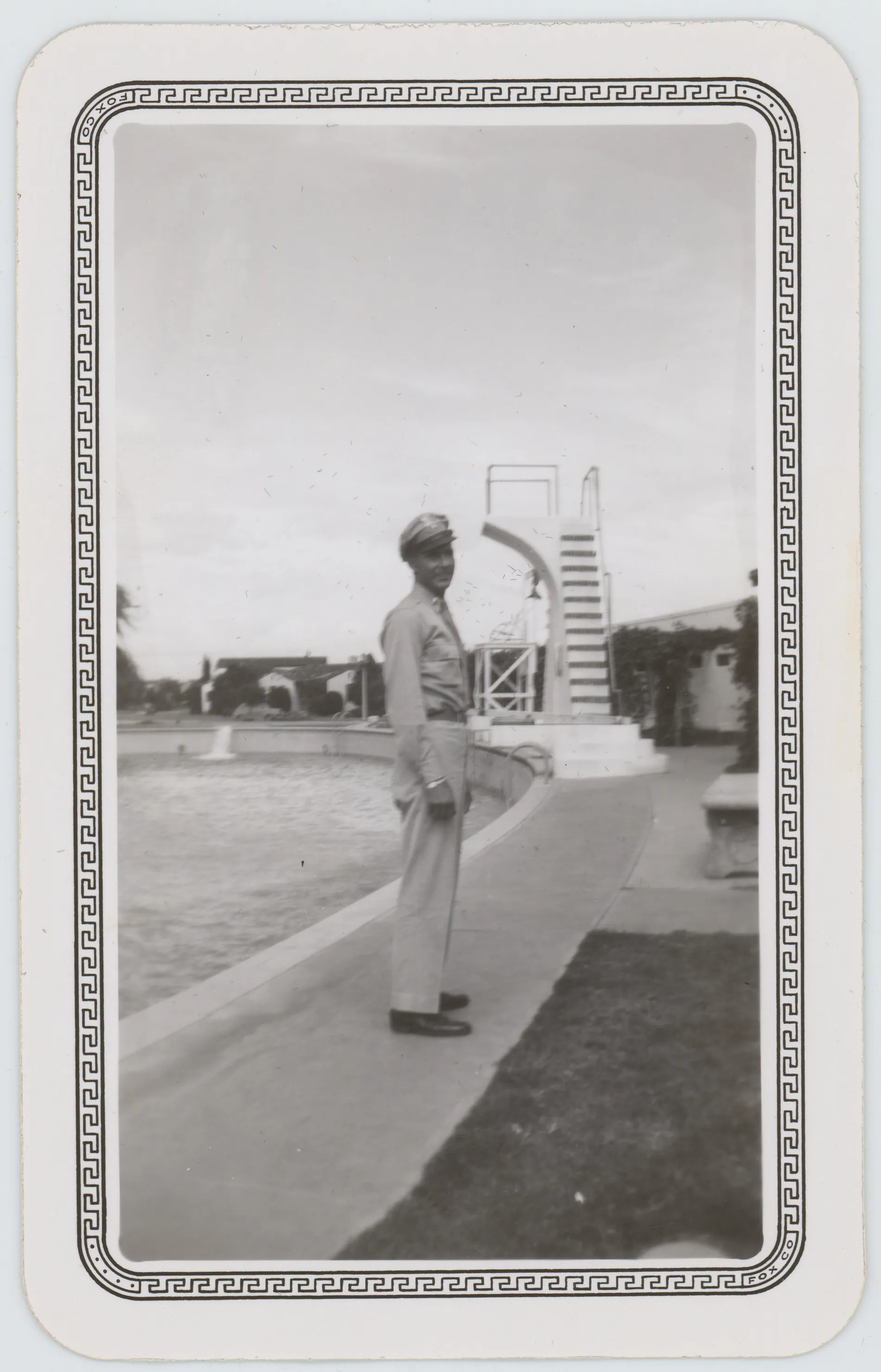 This photograph depicts Harold Allison standing next to a swimming pool. This photograph matches others labeled as being taken in San Antonio.