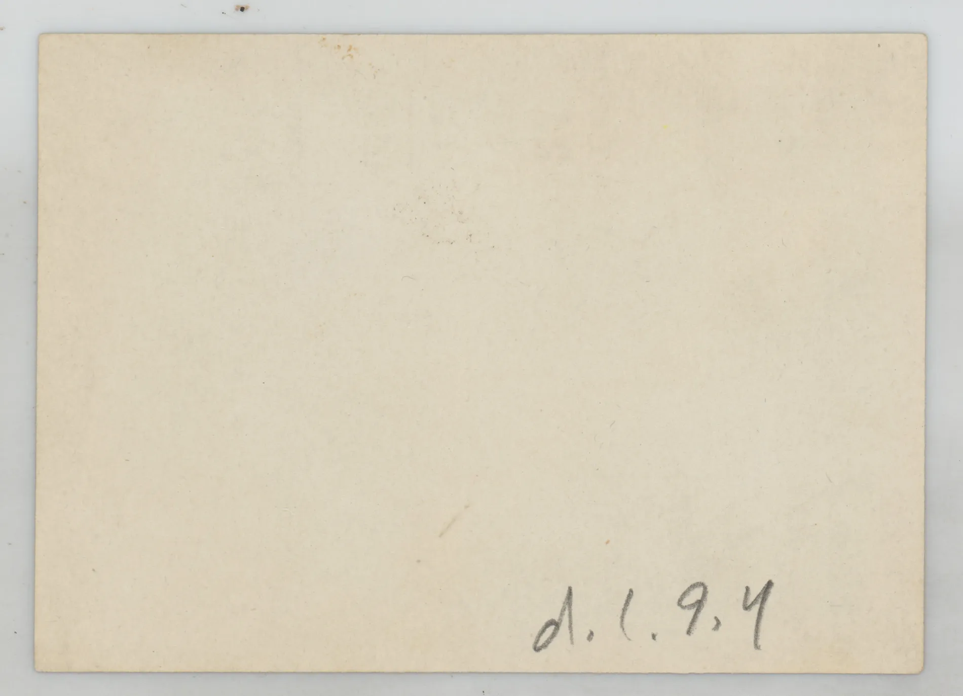 Verso: [Sammy McKinstry playing in the dirt with a dog]