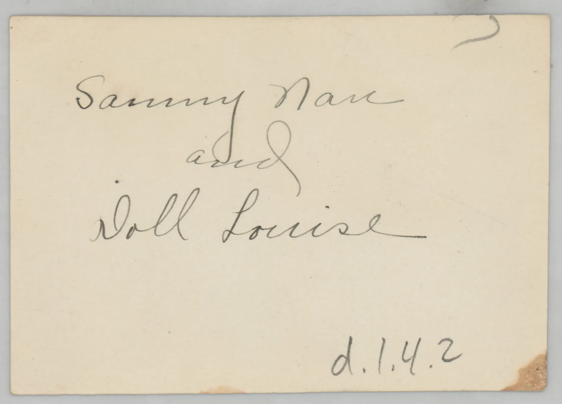Verso: [Sammy McKinstry pushing stroller with doll]
