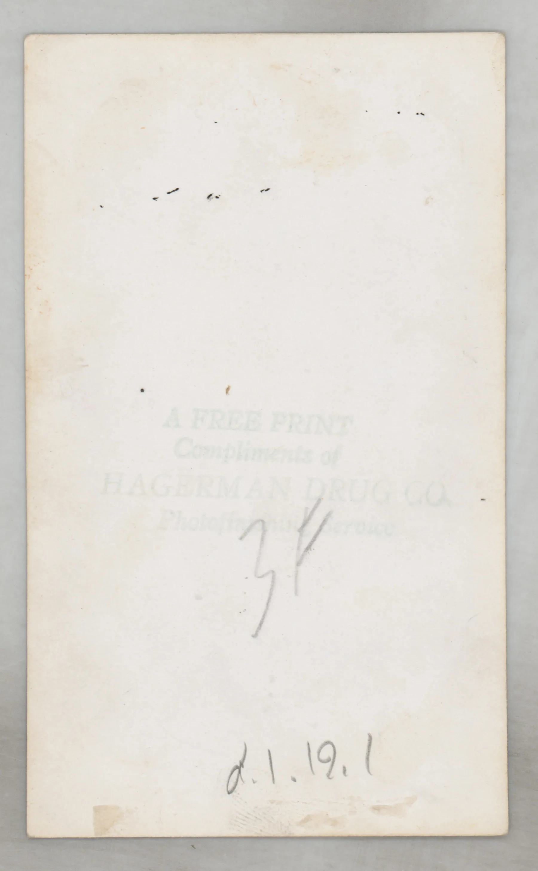 Verso: [Sara Beth West in a dress outside a house]
