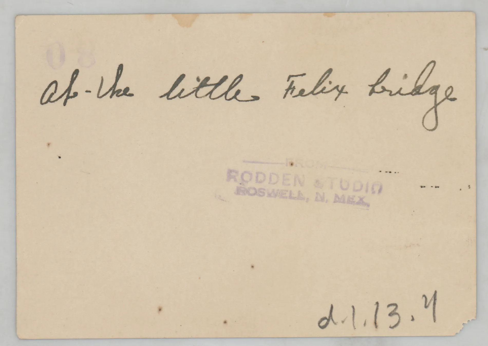 Verso: [Sammy and Jean McKinstry at the Little Felix bridge]