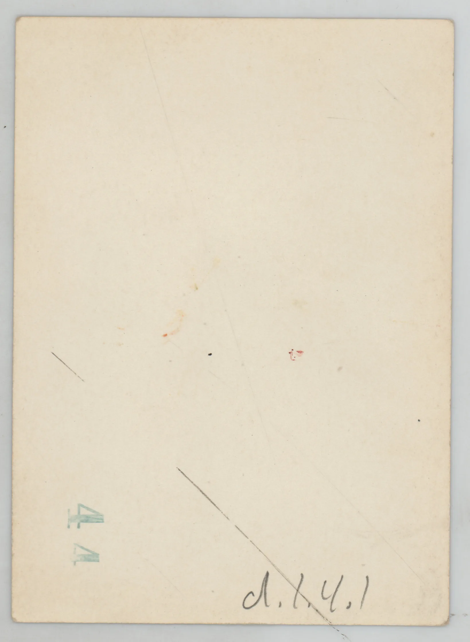 Verso: [Sammy McKinstry in dress next to house]