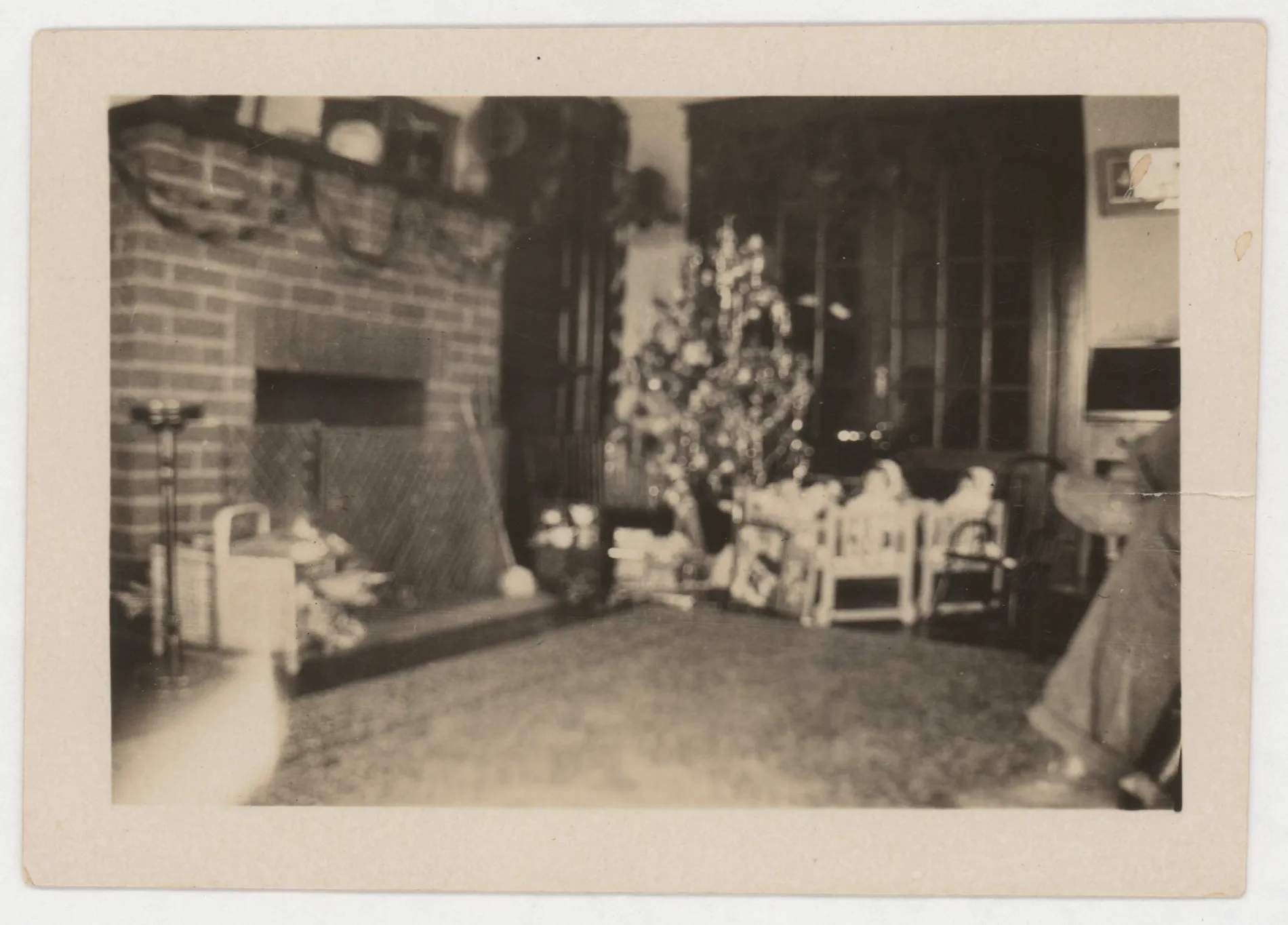 This photograph depicts a Christmas scene at the McKinstry home in Hagerman, New Mexico during the first half of the 1920s.