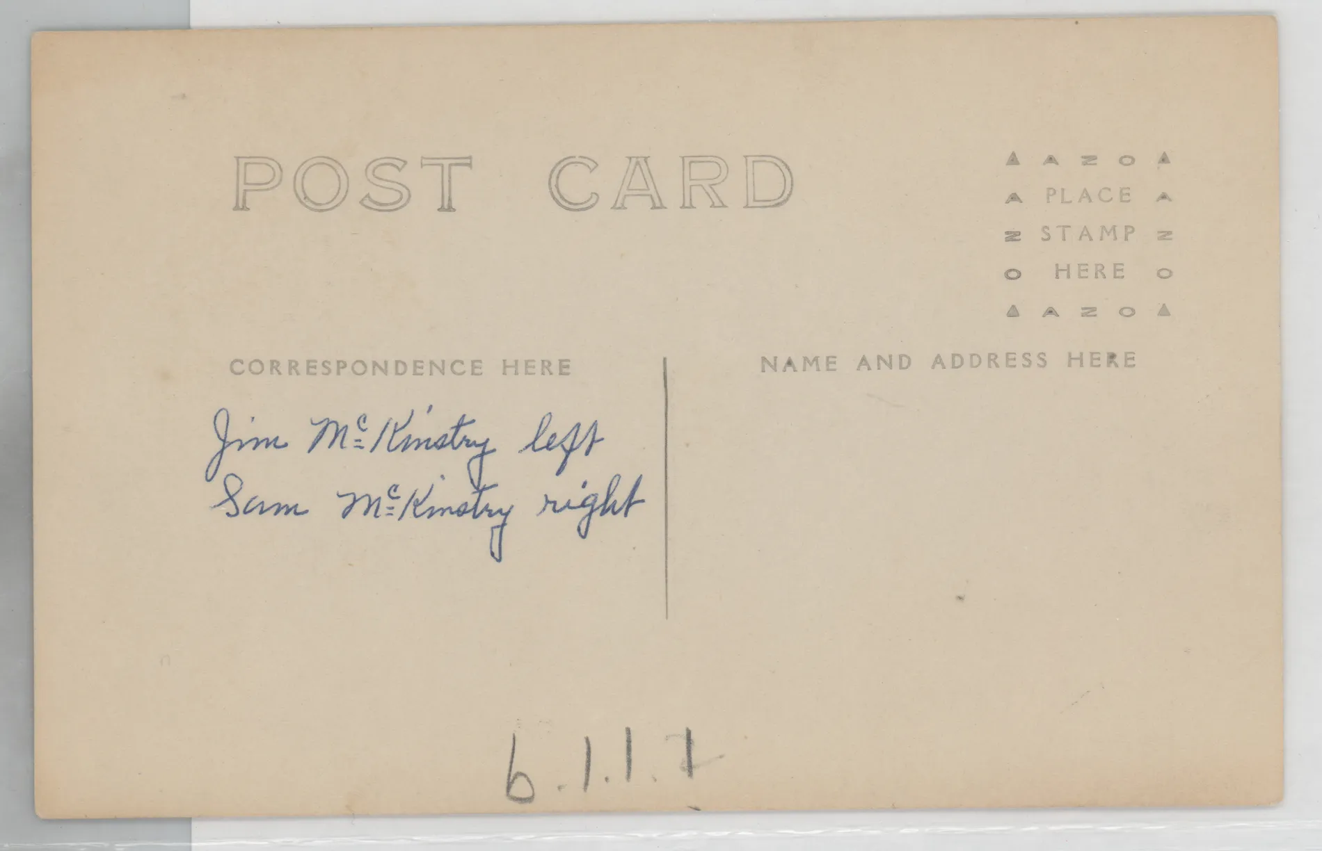 Verso: [Jim and Sam McKinstry next to a house]