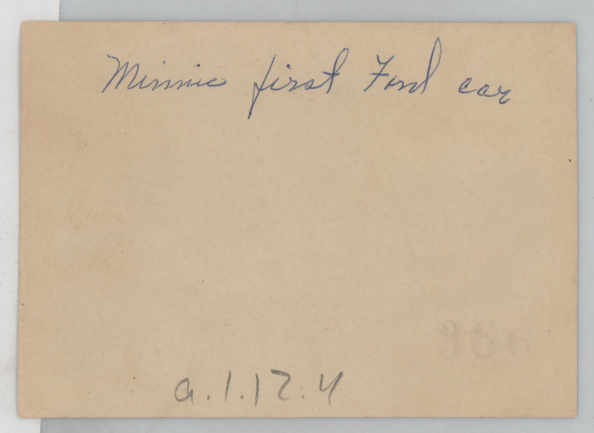 Verso: [Minnie McKinstry and first Ford car]