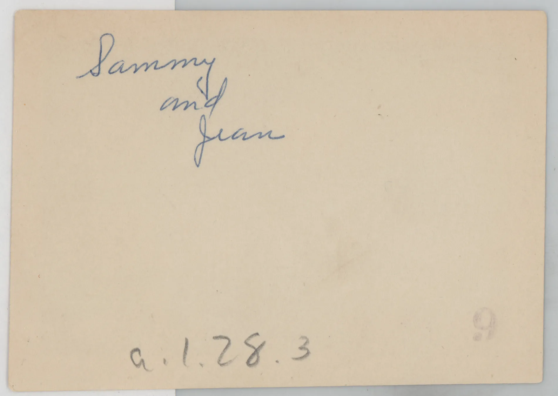 Verso: [Sammy and Jean McKinstry on a porch]