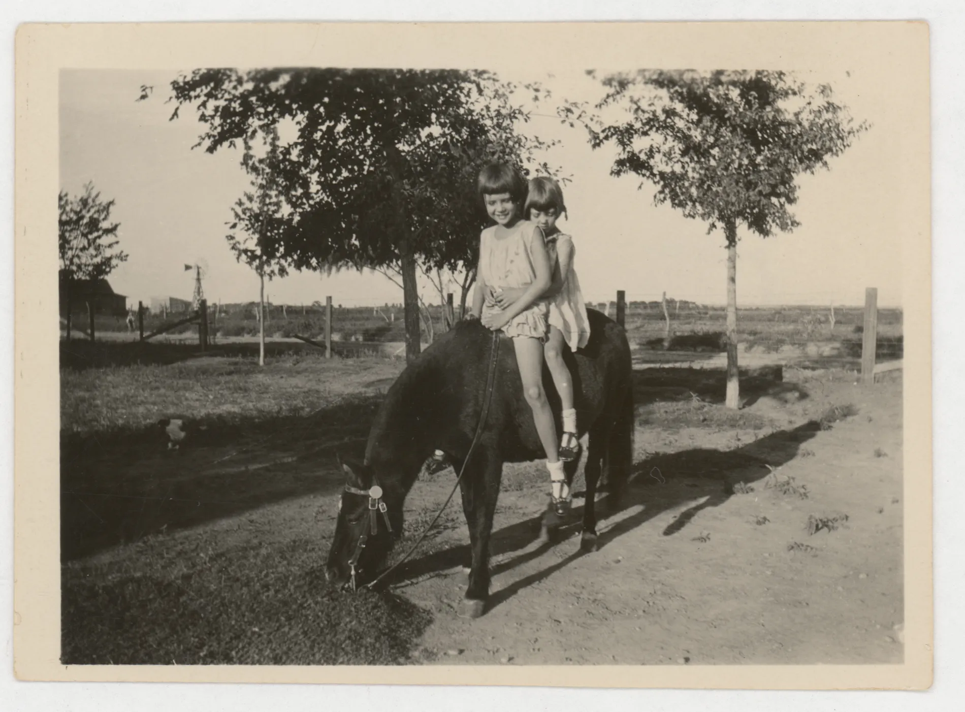 This photograph depicts Sammy and Jean McKinstry on a horse around the year 1929.