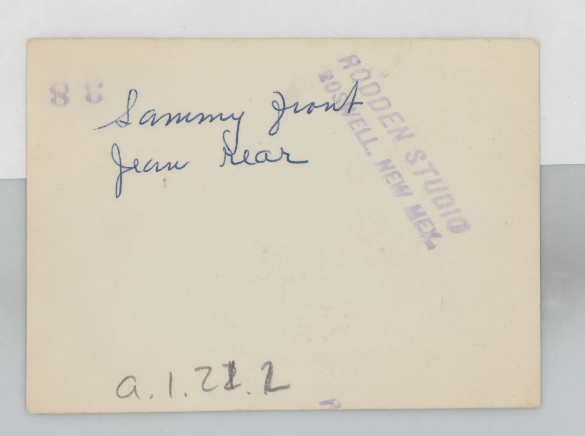 Verso: [Sammy and Jean McKinstry on a horse]