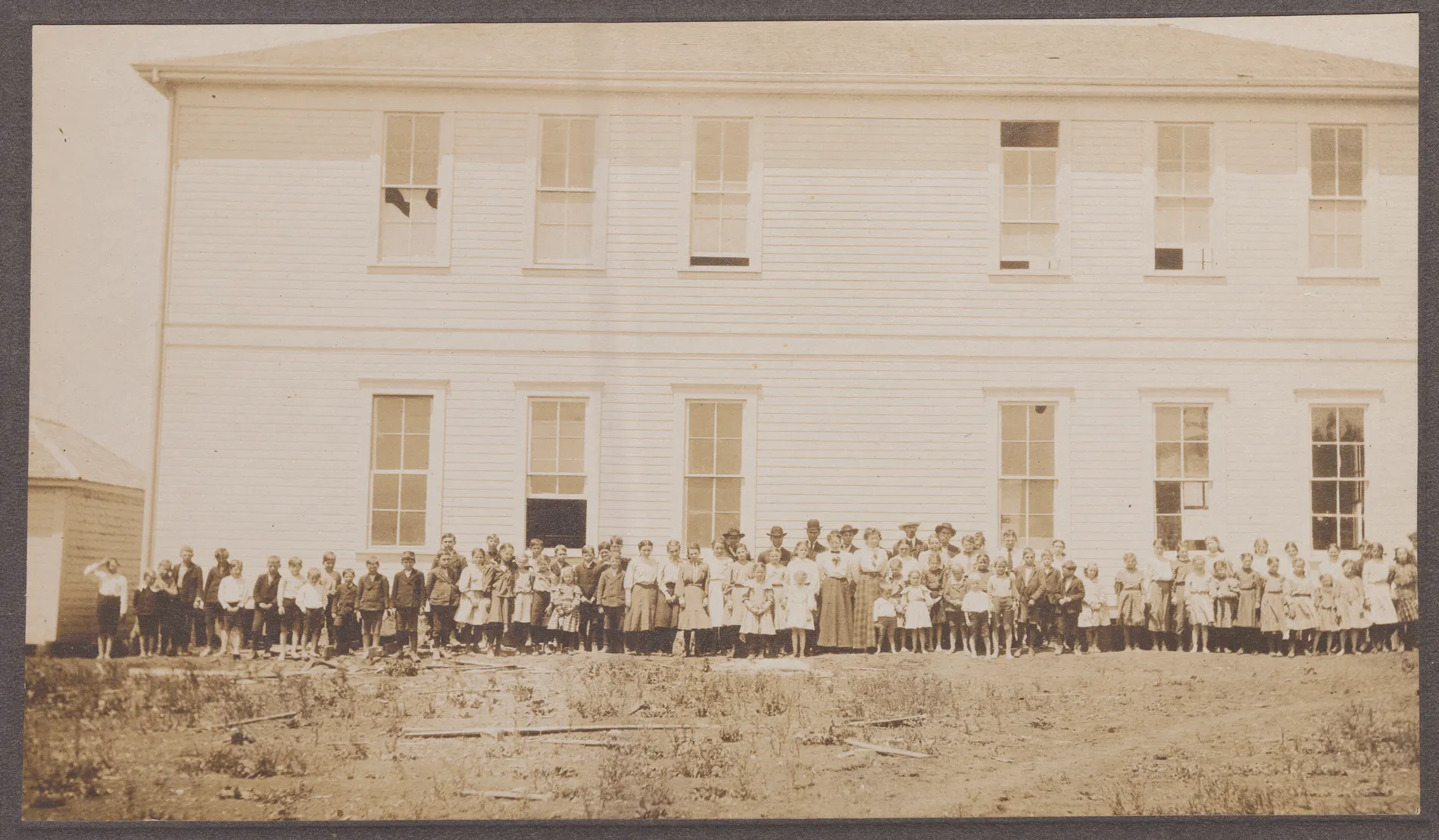 This photograph depicts the Jacobia School around the turn of the century. Students and teachers are visible, but no one can be certainly identified. It is presumed Eva, Minnie, and Loveta Swann and other family members may be in this photograph.