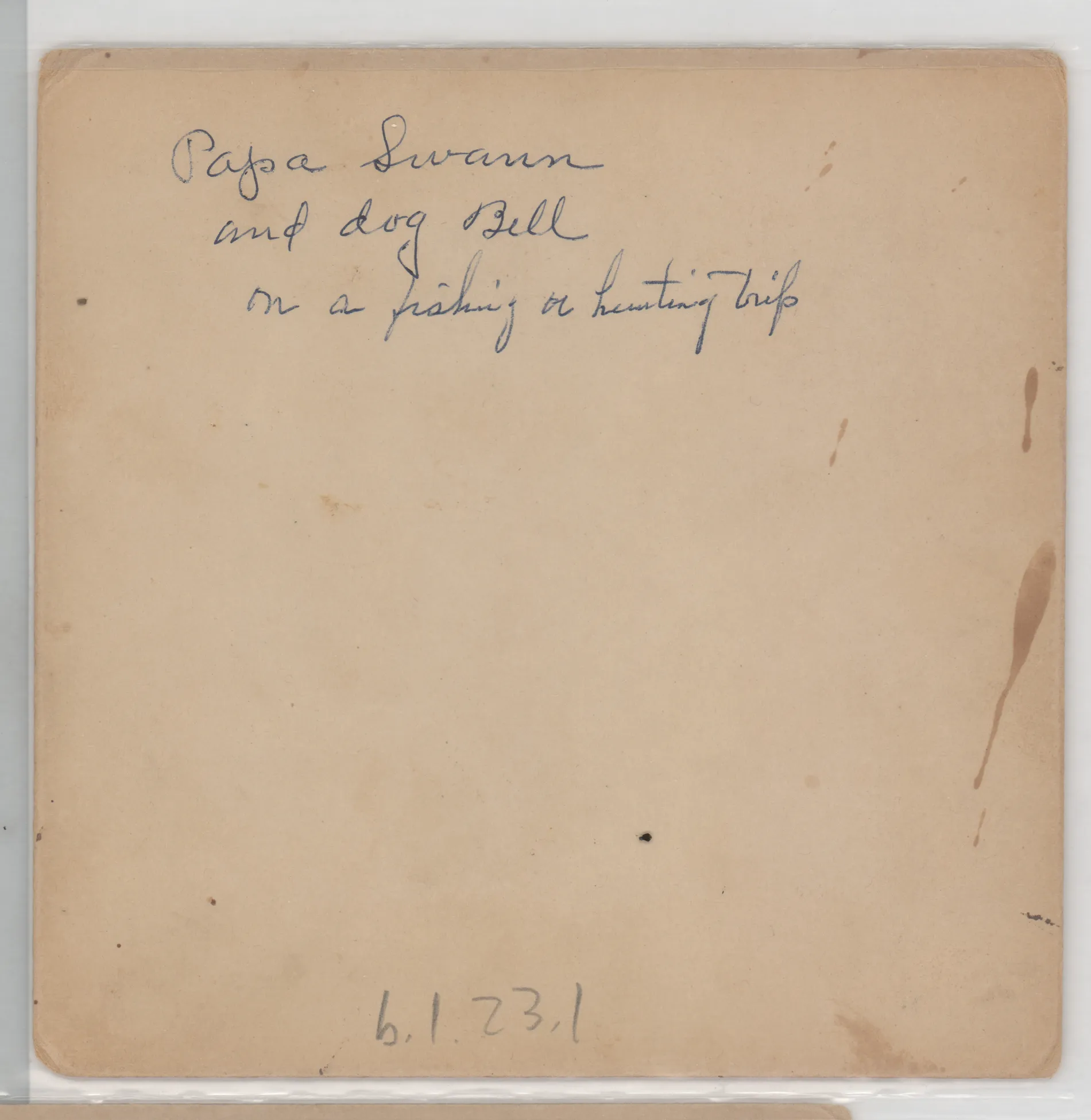 Verso: [Austin Swann on a fishing or hunting trip]