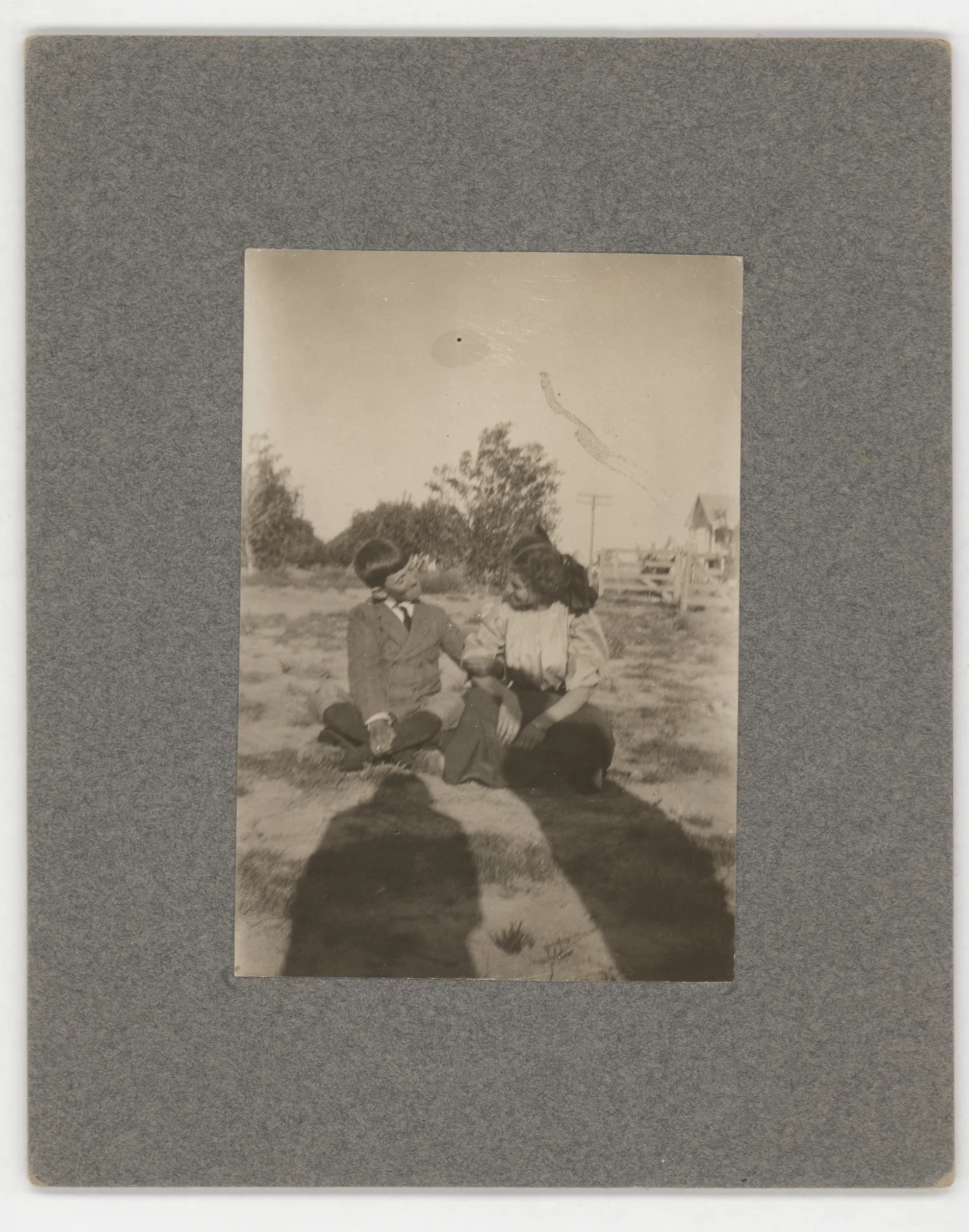 This photograph depicts C.E. Girdner on a horse next to a barn in 1911.