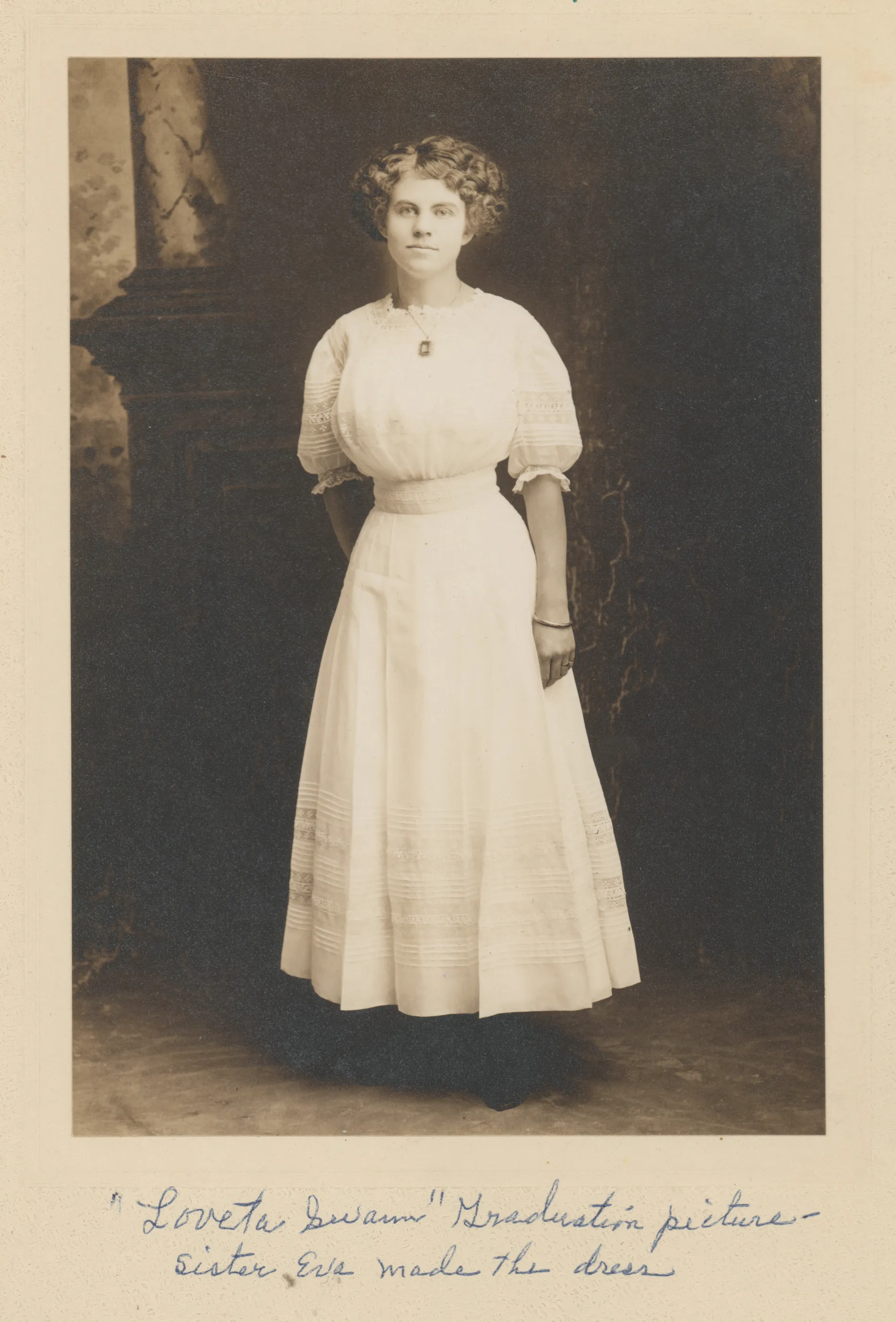 This is Loveta Swann's graduation picture from about 1911. Her sister Eva made this dress.