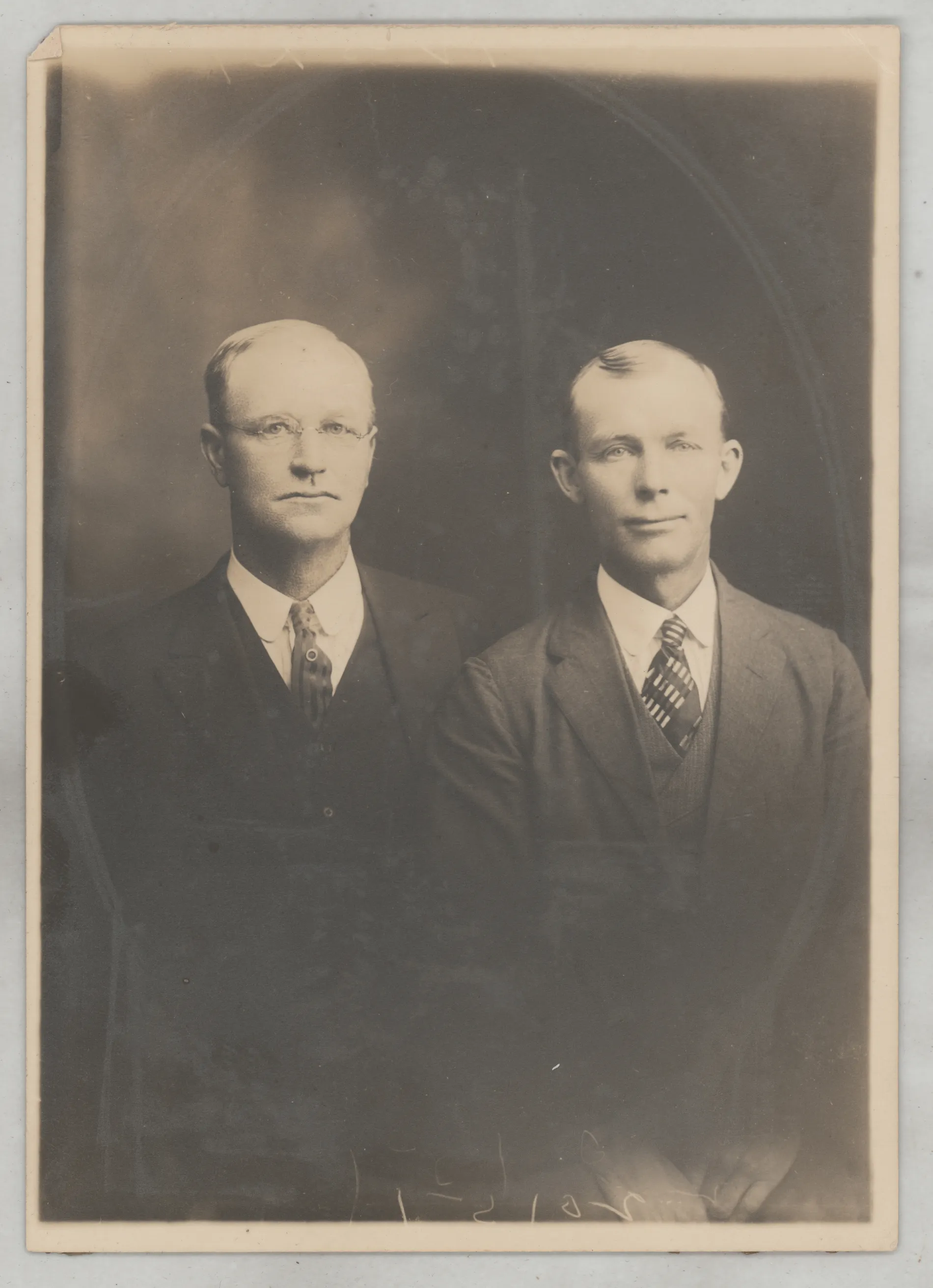 This is a formal portrait of Norphlet "Bud" Thomas and his brother John Thomas. The verso of this photograph says "Uncle Bud and Daddy (John). This photograph must have belong to one of John's children, Frances or Maxie.